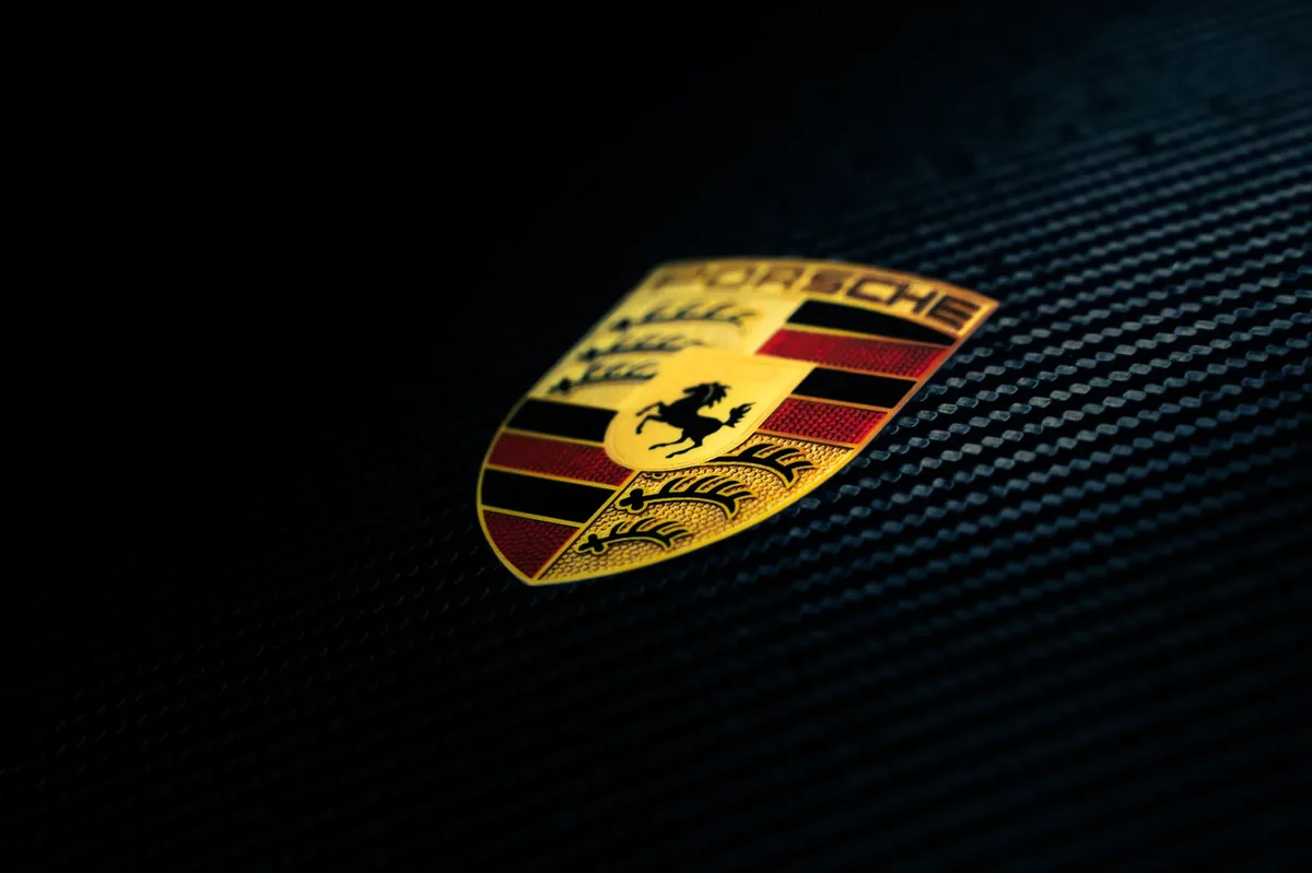 Porsche crest on carbon fiber